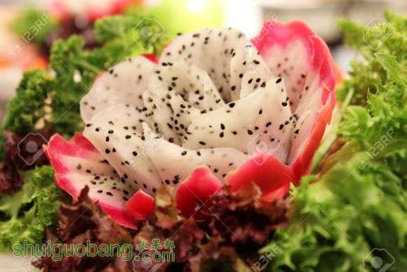 19088259-A-Fresh-dragon-fruit-carving-and-vegetable-Stock-Photo.jpg